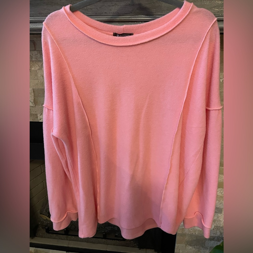 Such a pretty pink top with a brushed fleece feel.